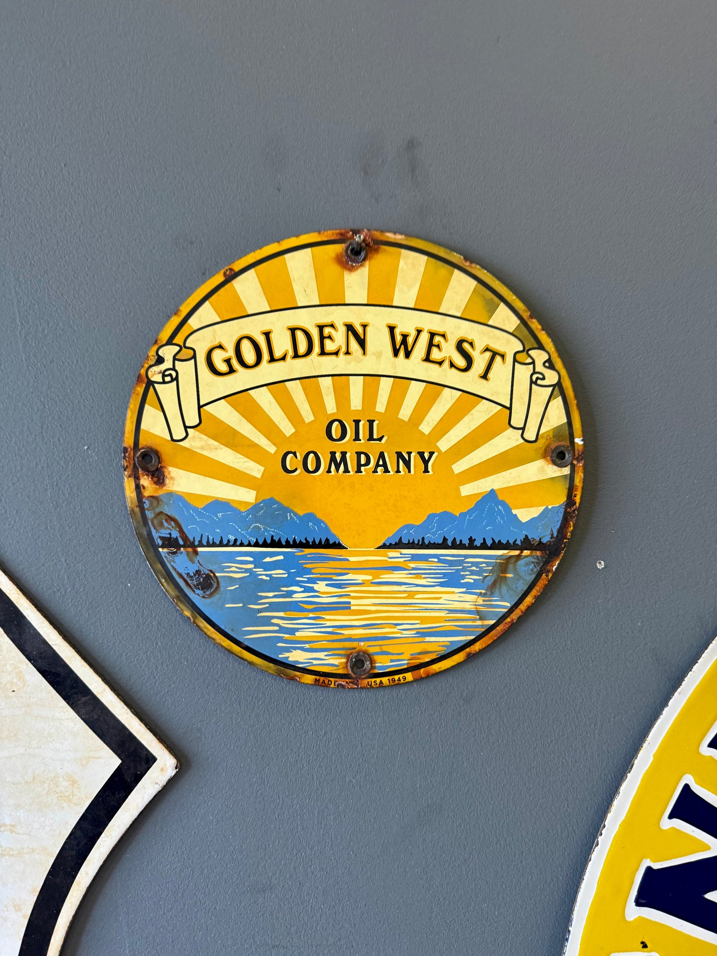 Original golden west oil company porcelain sign