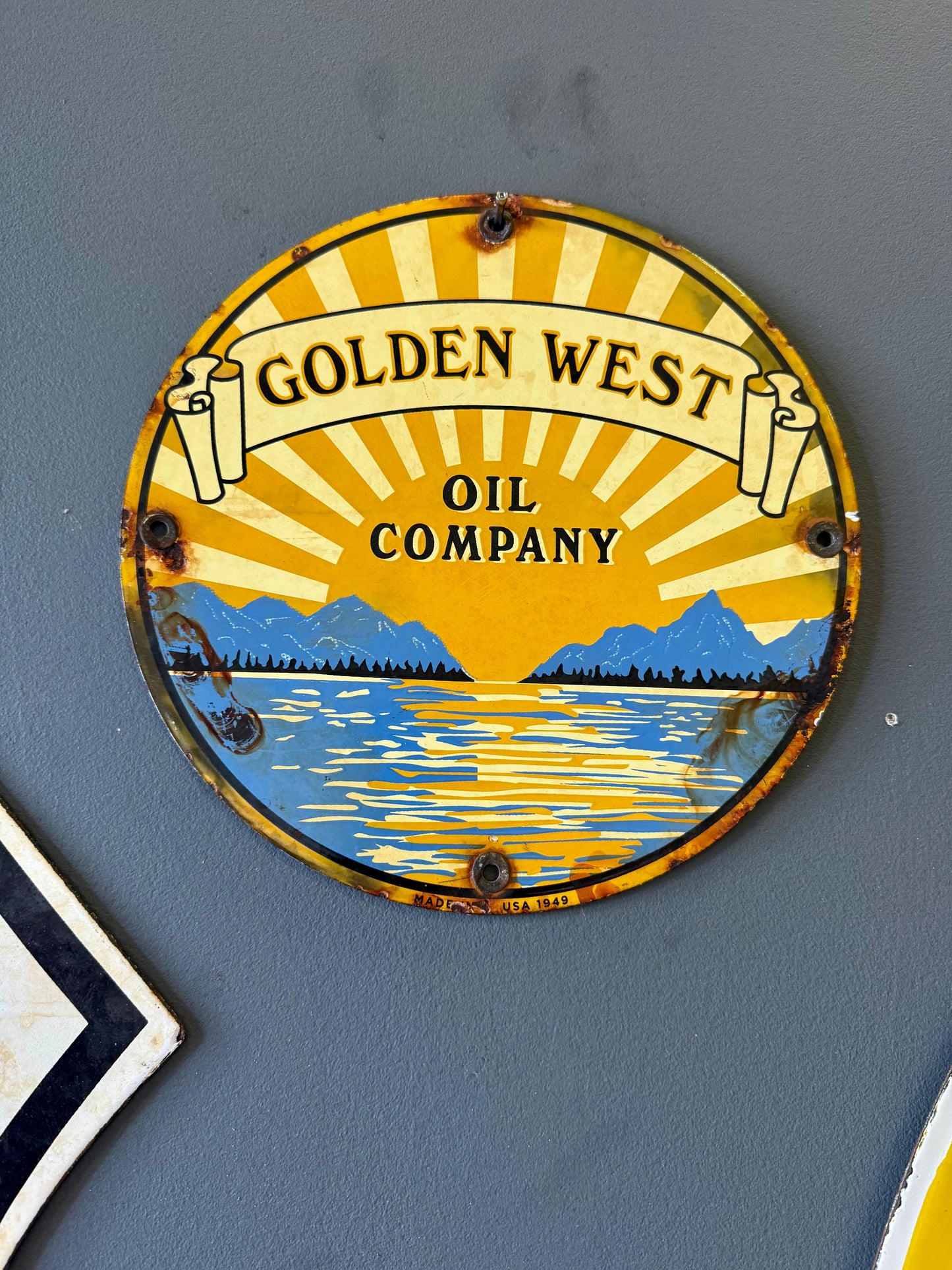 Original golden west oil company porcelain sign
