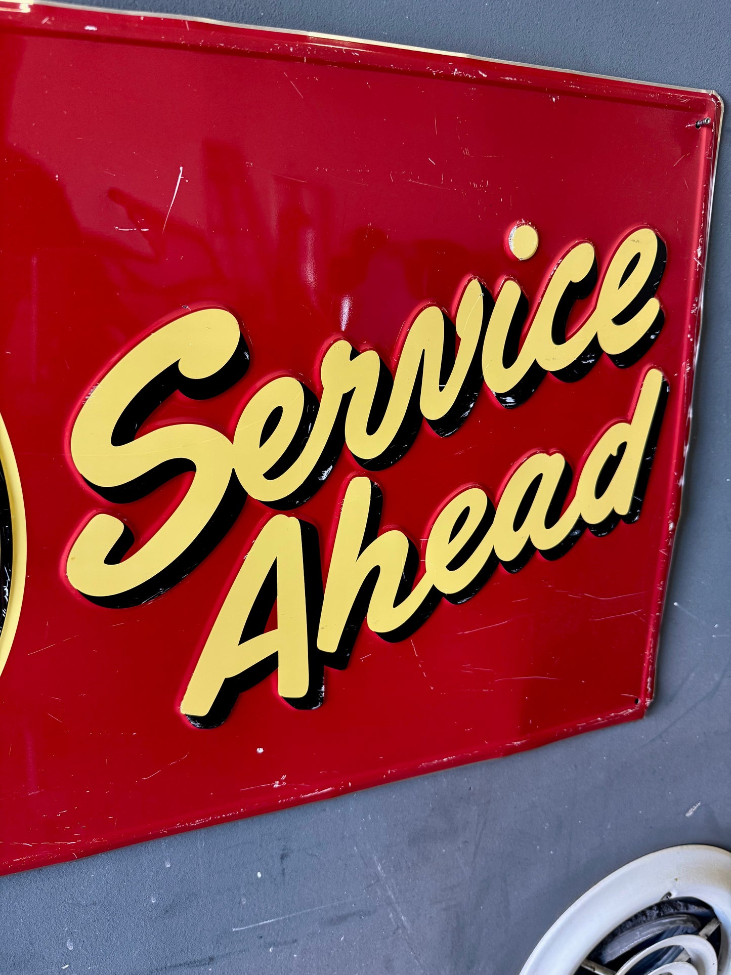 Tydol flying a gasoline embossed tin sign