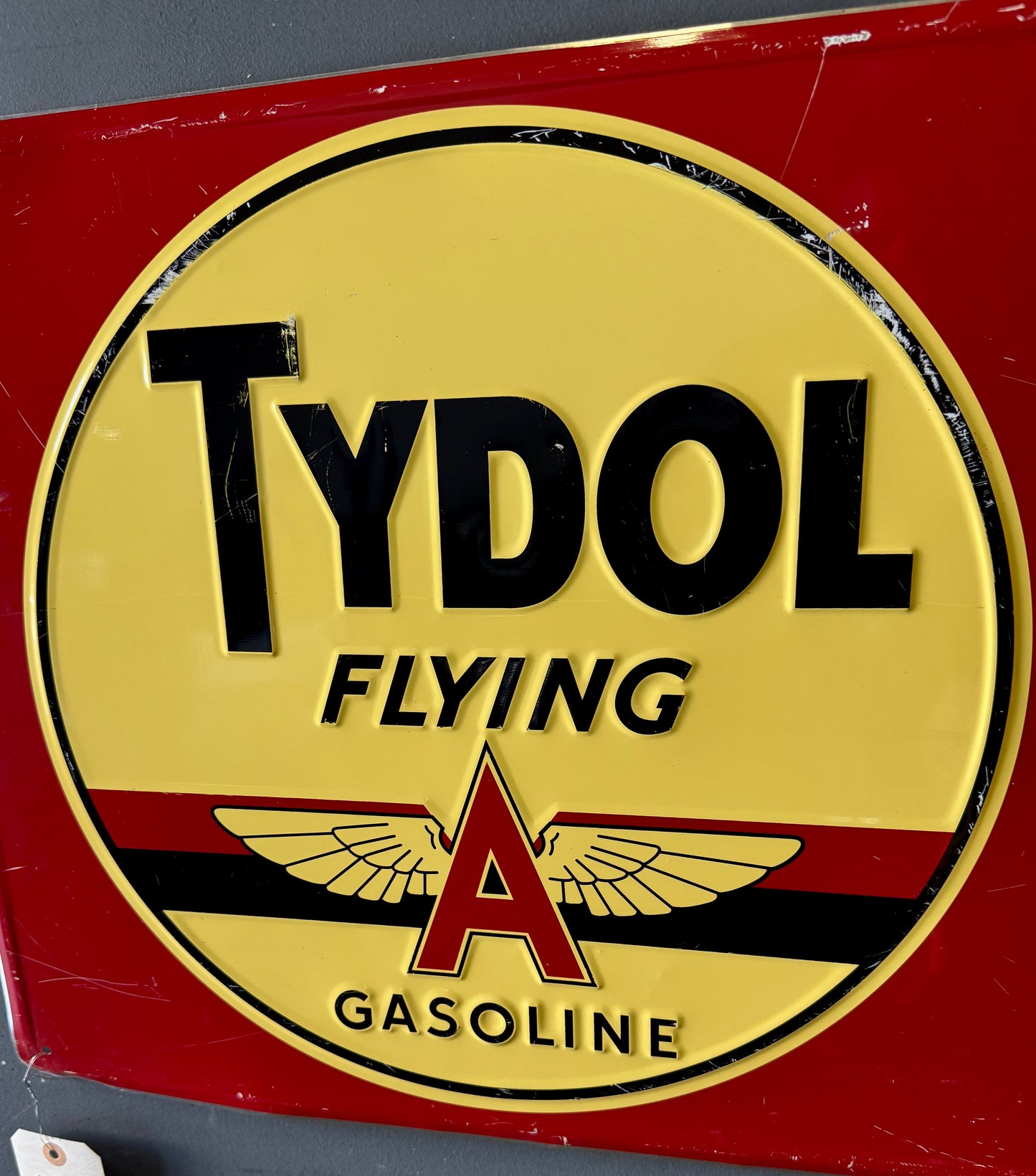 Tydol flying a gasoline embossed tin sign