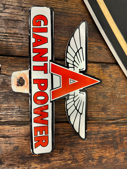 Porcelain flying a giant power sign